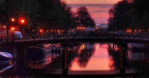 Amsterdam canal at night. Photo via Flickr:joiseyshowaa