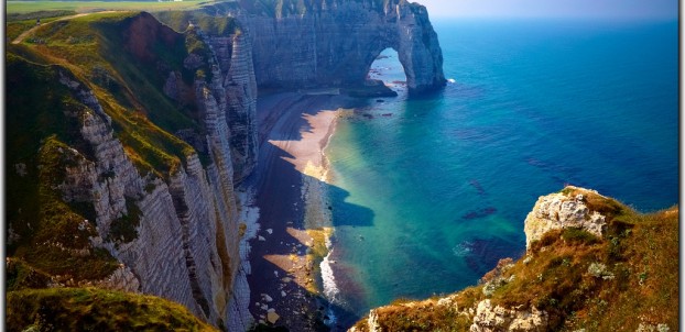 The famous Etretat cliffs in Normandy. Photo via Flickr:Moyan Brenn