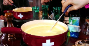 Don't miss out on Switzerland's traditional cheese fondue! Photo via Wikimedia Commons:Julien29