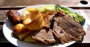 Traditional Sunday roast with potatoes. Photo via Wikimedia Commons:adactio