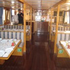 The spacious saloon offers enough room for having meals and spending some time with new friends.