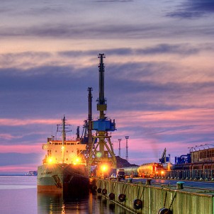 Rostock Harbor at sunset - photo via Wikimedia Commons:Maurice